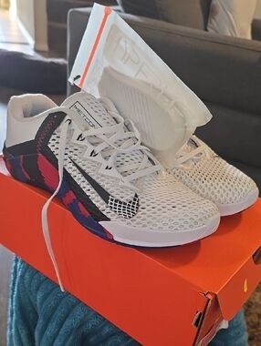 Nike Men’s White Athletic Training Shoes with Black and Pink Accents